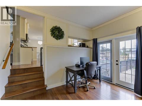 Glass doors with level access to back yard and pool at 1859-1861 Mountain Avenue, Glenmore, Kelowna