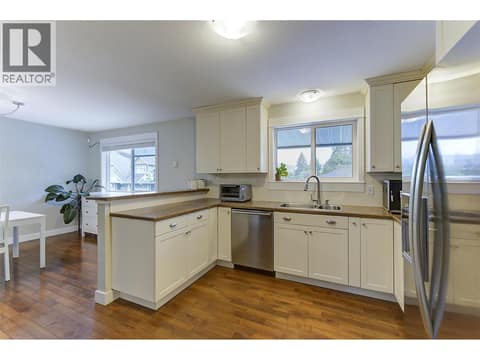 Open Kitchen to Dining Room area at 1859-1861 Mountain Avenue, Glenmore, Kelowna