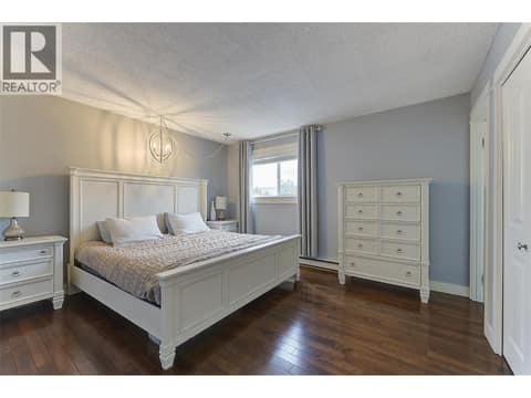 Primary bedroom up is oversized at 1859-1861 Mountain Avenue, Glenmore, Kelowna