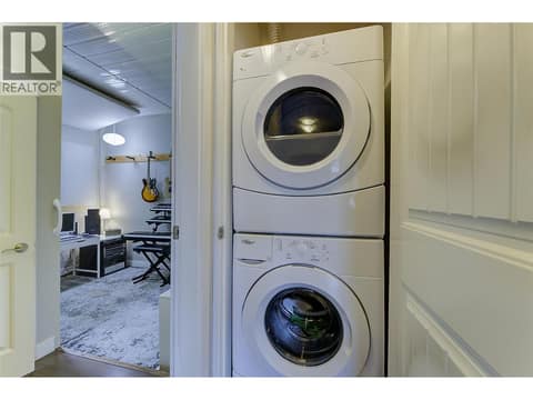 Stacker washer and dryer for main home at 1859-1861 Mountain Avenue, Glenmore, Kelowna
