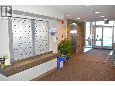 Main Building Entrance at 1403-1000 Talasa Way, Sun Rivers, Kamloops