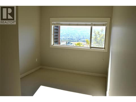 Primary Bedroom at 1403-1000 Talasa Way, Sun Rivers, Kamloops