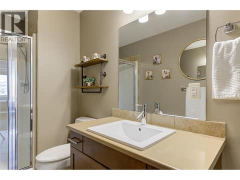 Main Bathroom and cheater Ensuite at 2142 Vasile Road Unit# #409, Springfield/Spall, Kelowna