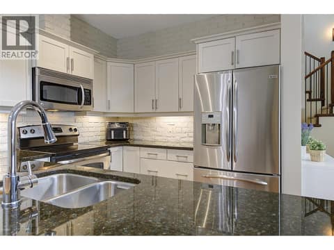 Quartz counters, under cabinet lighting, SS appliances at 2142 Vasile Road Unit# #409, Springfield/Spall, Kelowna