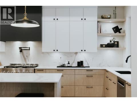 Abundant kitchen storage with thoughtful designed cabinetry at 5533 Foothill Court, Kettle Valley, Kelowna