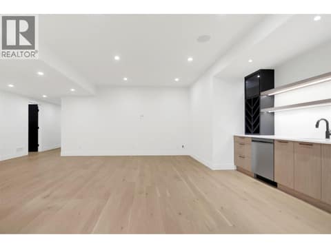 An entertainer's dream with space for a TV area and room for a pool table - ideal for family fun at 5533 Foothill Court, Kettle Valley, Kelowna