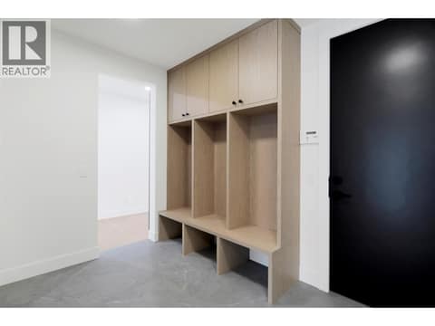 Mudroom with ample storage and a spacious closet at 5533 Foothill Court, Kettle Valley, Kelowna