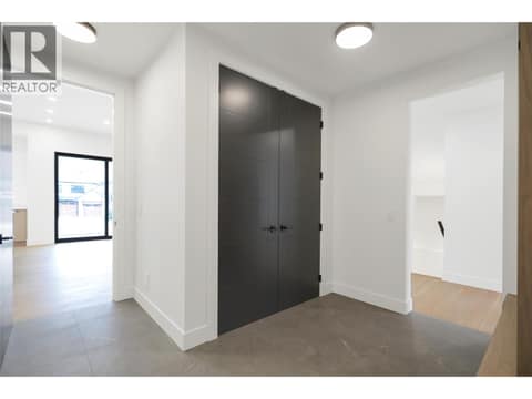 Mudroom with ample storage and a spacious closet at 5533 Foothill Court, Kettle Valley, Kelowna
