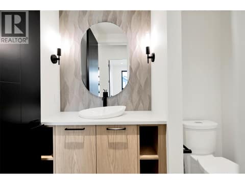 Powder room on main at 5533 Foothill Court, Kettle Valley, Kelowna