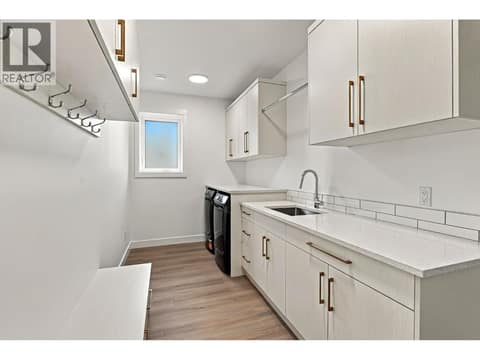 Main house laundry at 491 Clifton Road N, Glenmore, Kelowna