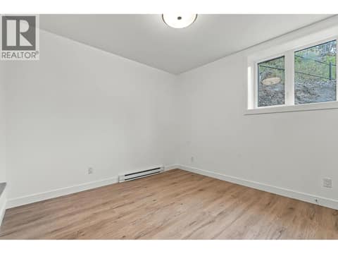 Suite Bedroom Two at 487 Clifton Road N, Glenmore, Kelowna