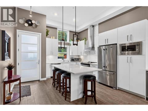 Modern white kitchen at 9700 Santina Road Unit# 14, Lake Country North West