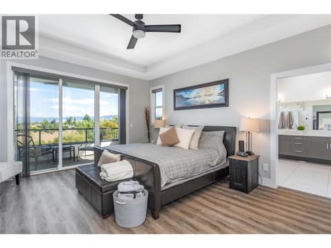 Primary Bedroom with stunning lake views and natural light - Upper Floor at 1528 FAWN RUN Drive, Upper Mission, Kelowna