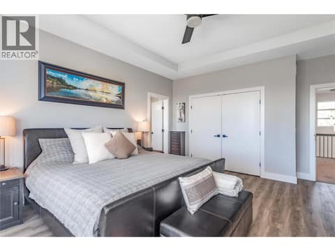 Primary Bedroom with another Washer/Dryer located off the ensuite area at 1528 FAWN RUN Drive, Upper Mission, Kelowna
