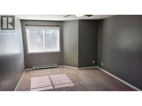 Primary Bedroom at 255 Aurora Crescent Unit# 204, Rutland North, Kelowna