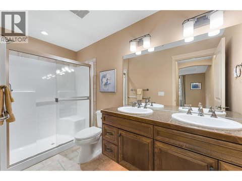 Luxurious ensuite with  heated floors, double sinks and sensor vanity lighting. at 2780 Auburn Road Unit# 203, Shannon Lake, West Kelowna