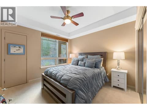 Second bedroom, thoughtfully located at the opposite end of the condo. at 2780 Auburn Road Unit# 203, Shannon Lake, West Kelowna