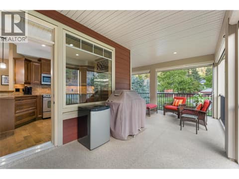 Walk out of the kitchen straight onto your private covered deck. at 2780 Auburn Road Unit# 203, Shannon Lake, West Kelowna