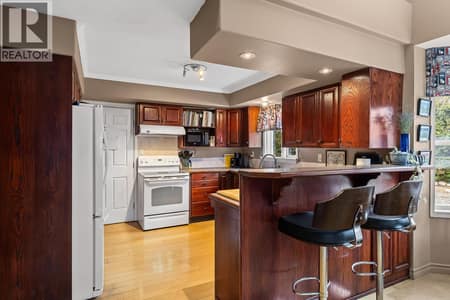 Kitchen at 3219 Sagebrush Court, Shannon Lake, West Kelowna