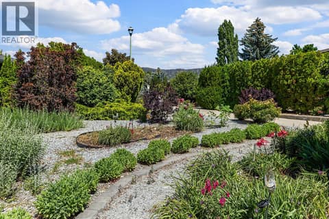 Landscaped front yard at 3219 Sagebrush Court, Shannon Lake, West Kelowna