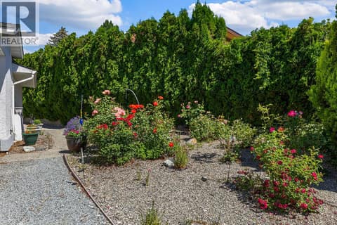 Rose garden at 3219 Sagebrush Court, Shannon Lake, West Kelowna