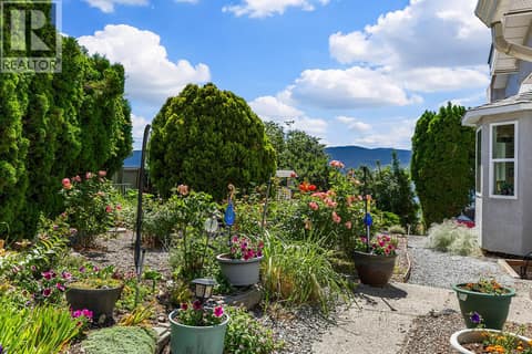 Side yard at 3219 Sagebrush Court, Shannon Lake, West Kelowna