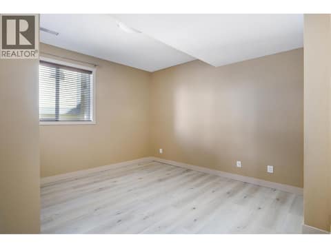 Second suite bedroom at 1377 Glenview Avenue, Glenmore, Kelowna