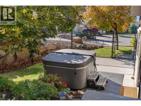 Hot tub off the lower kitchen at 2533 Copper Ridge Drive, Smith Creek, West Kelowna