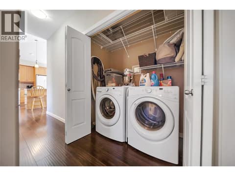Main floor laundry at 2533 Copper Ridge Drive, Smith Creek, West Kelowna