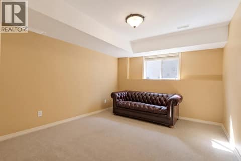 Bedroom #3 Down at 1950 Capistrano Drive Unit# 108, University District, Kelowna