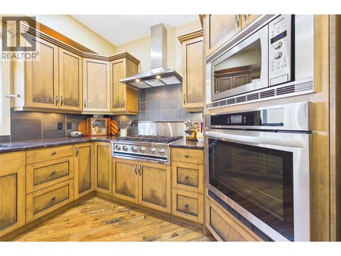 Built-in Wall Oven, Microwave and Prof. Grade 6 burner Gas Cooktop at 1950 Capistrano Drive Unit# 108, University District, Kelowna