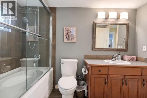 Entrance to Bathroom Down from Bedroom #3 at 1950 Capistrano Drive Unit# 108, University District, Kelowna