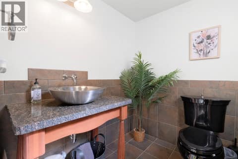 Half Bathroom Down at 1950 Capistrano Drive Unit# 108, University District, Kelowna