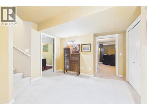 Landing Down to Media and Bedroom #2 at 1950 Capistrano Drive Unit# 108, University District, Kelowna
