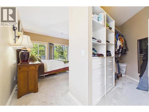 Primary with open Walk-in Closet at 1950 Capistrano Drive Unit# 108, University District, Kelowna