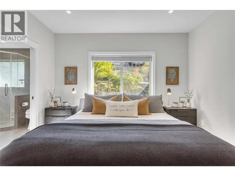 Primary bedroom faces rear yard green space at 1113 Mt Fosthall Drive, Middleton Mountain Vernon