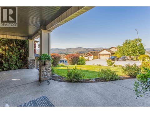 Spacious and inviting front patio ~ so many lounging areas! at 1113 Mt Fosthall Drive, Middleton Mountain Vernon