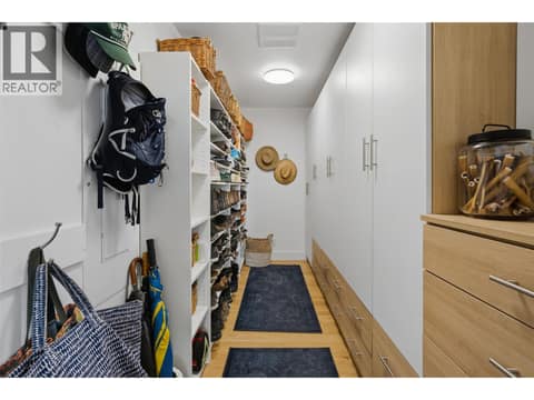 Front Closet custom Cabinetry at 5147 Lakeshore Road, Upper Mission, Kelowna