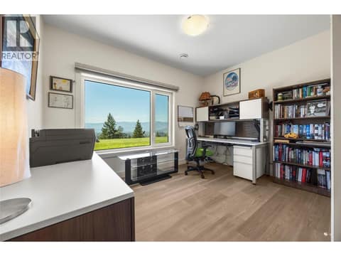 3rd bedroom on lower level with lake views at 2442 Bella Vista Street, Black Mountain, Kelowna