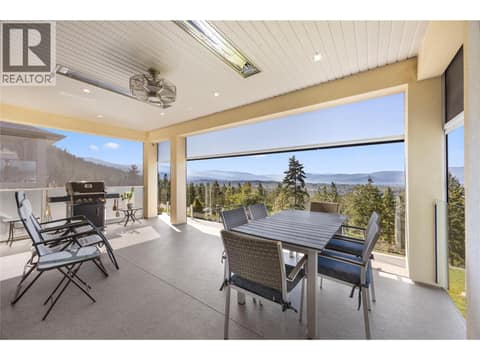 Built-in infrared heaters and roughed-in for a mist cooling system and staircase to backyard at 2442 Bella Vista Street, Black Mountain, Kelowna