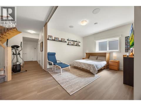 Flex room set up as a bedroom at 2442 Bella Vista Street, Black Mountain, Kelowna