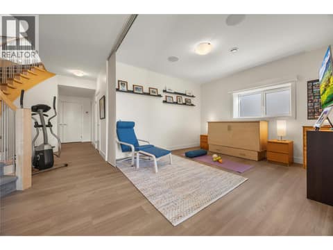 Lower level flex space/den with retractable room divider at 2442 Bella Vista Street, Black Mountain, Kelowna