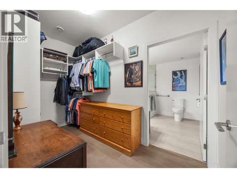 Walk through closet to the 4 pc ensuite at 2442 Bella Vista Street, Black Mountain, Kelowna