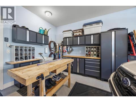 Workbench in 2 car Garage at 2442 Bella Vista Street, Black Mountain, Kelowna