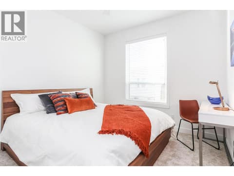 Similar too  - Primary Bedroom at 610 Academy Way Unit# 111, University District, Kelowna