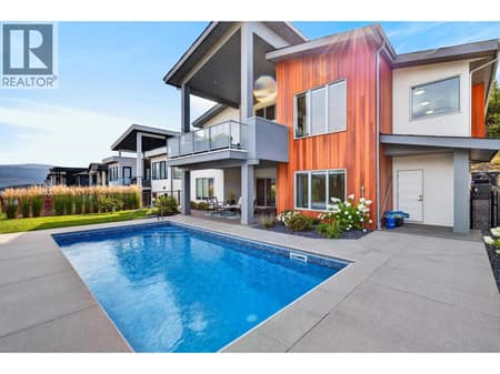 Beautiful backyard with in-ground pool at 887 Loseth Drive, Black Mountain, Kelowna