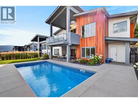 Beautiful backyard with in-ground pool at 887 Loseth Drive, Black Mountain, Kelowna