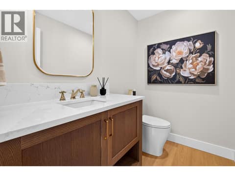 Main floor Powder Room at 887 Loseth Drive, Black Mountain, Kelowna
