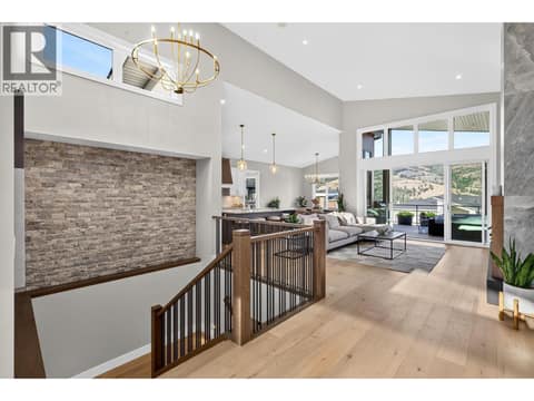 Stairs to lower level at 887 Loseth Drive, Black Mountain, Kelowna