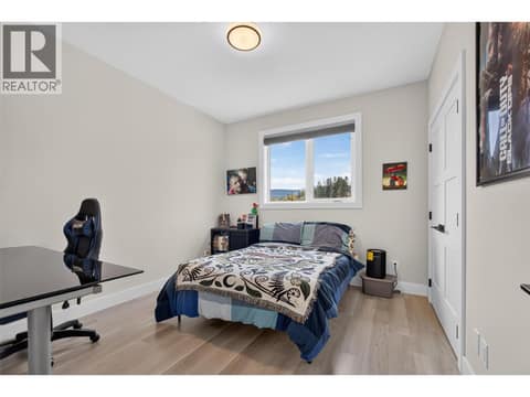 Third upstairs bedroom at 2400 Hawks Boulevard, Westbank Centre, West Kelowna